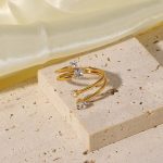 Side by side, large and small white zirconium 4-diamond split rings 18K gold-plated