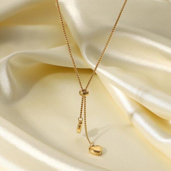 Titanium steel necklace with 14K gold Y-shaped rope chain and two heart-shaped pendant necklaces
