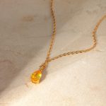 Golden zircon droplet shaped pendant necklace